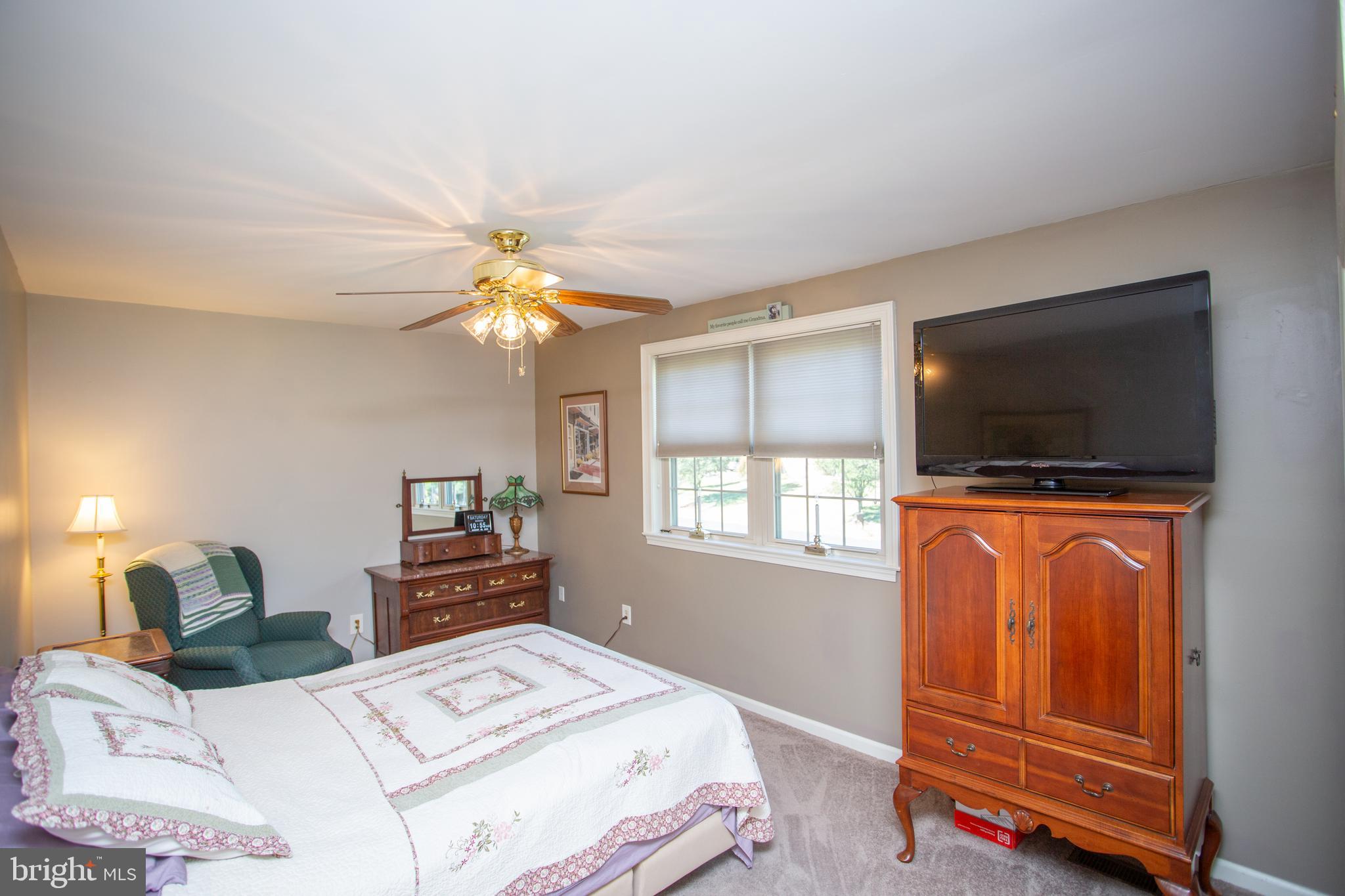 2018 Buckingham Drive Jamison, PA 18929 - Photo 19 of 28 a bedroom with a bed and a flat screen tv