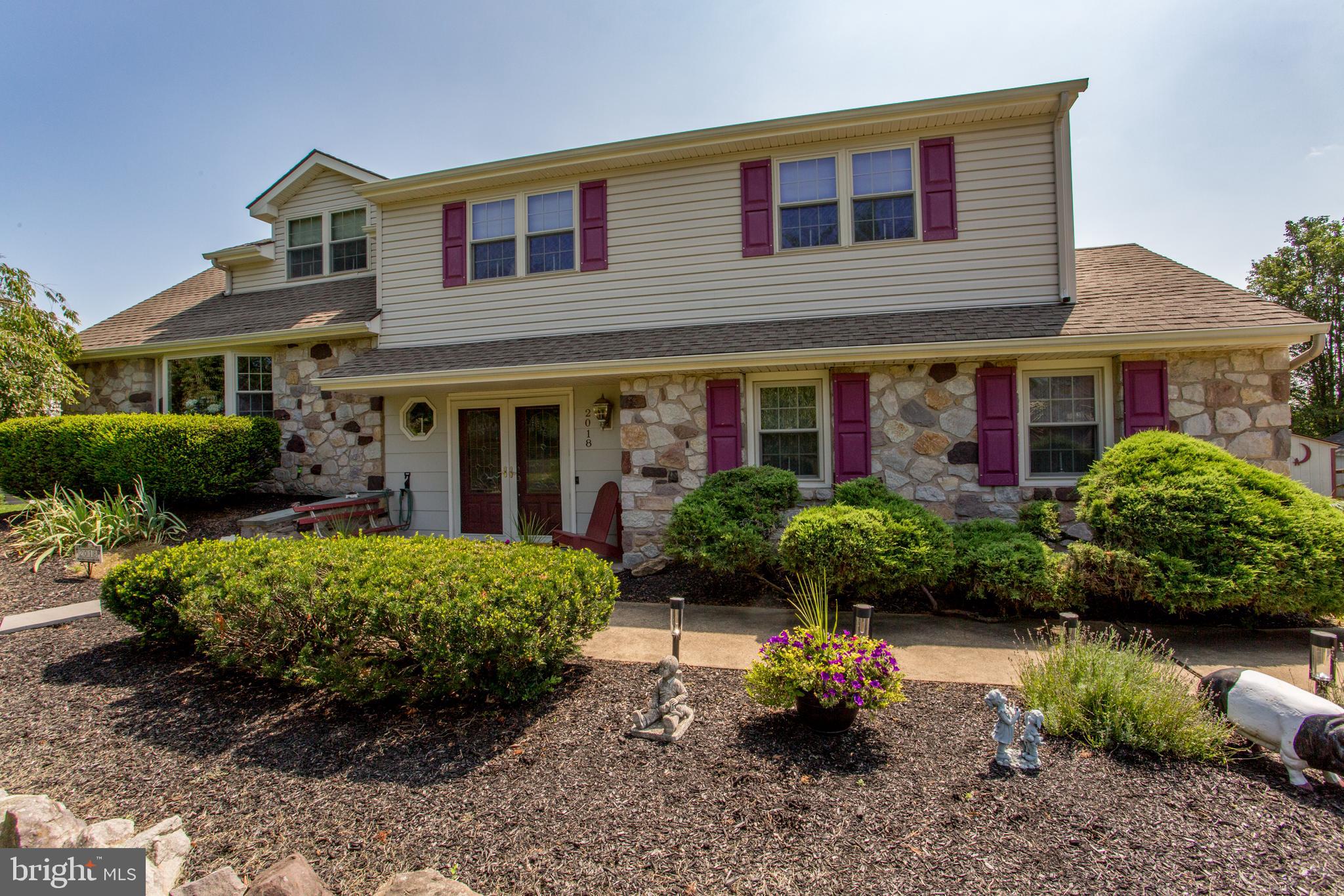 2018 Buckingham Drive Jamison, PA 18929 - Photo 2 of 28 a front view of a house with a yard