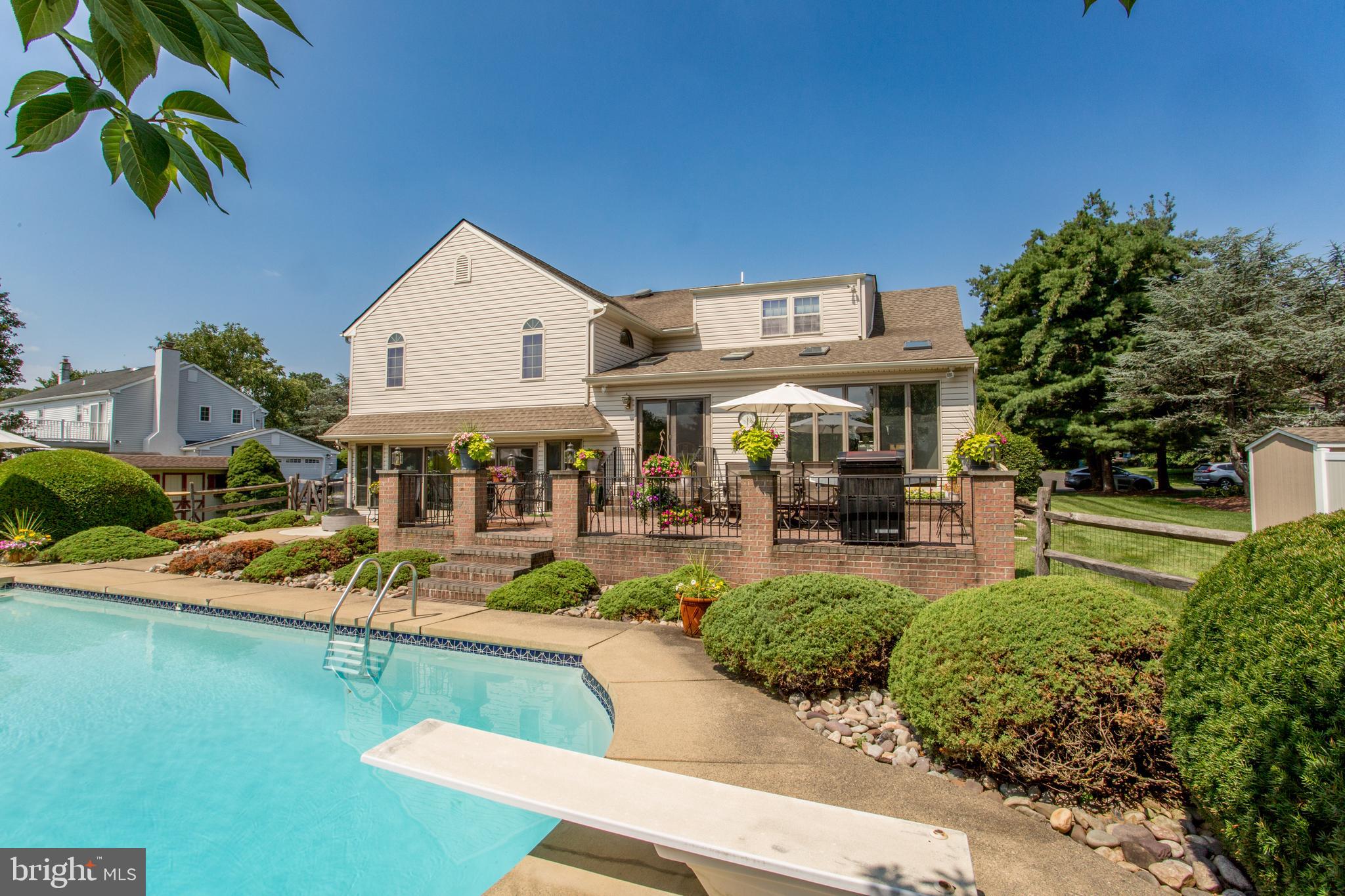 2018 Buckingham Drive Jamison, PA 18929 - Photo 25 of 28 a view of a house with swimming pool patio and sitting area