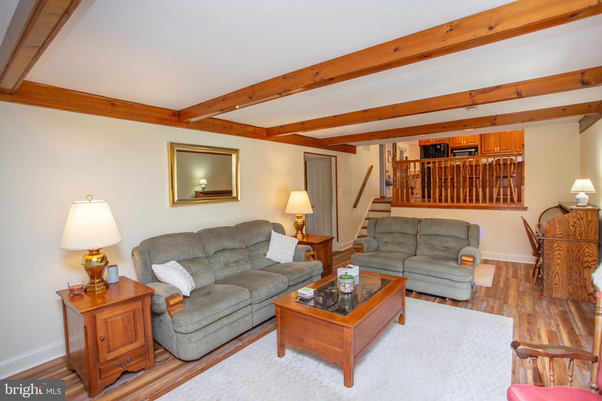 2018 Buckingham Drive Jamison, PA 18929 - Photo 10 of 28 a living room with furniture a lamp and a window