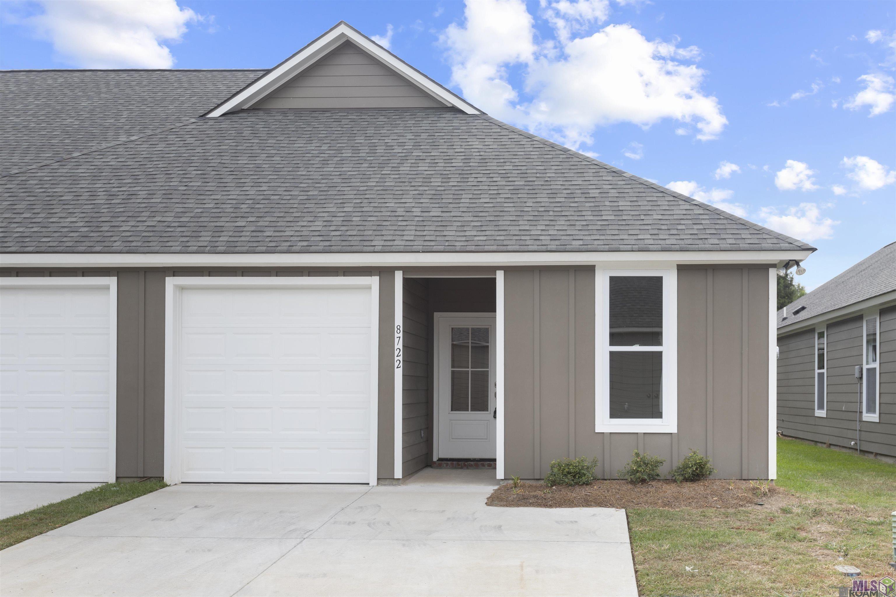 8722 Edgewater Drive Baton Rouge, LA 70820 - Photo 1 of 15 Front of home with parking pad & garage