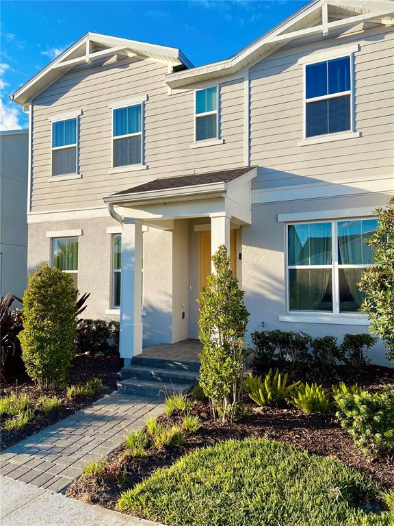 1577 Pinecliff Drive Apopka, FL 32703 - Photo 1 of 37 a front view of a house with a yard