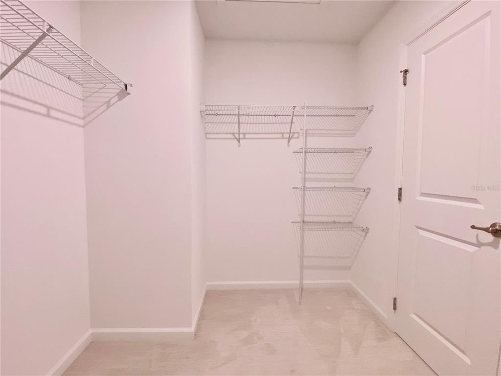 1577 Pinecliff Drive Apopka, FL 32703 - Photo 16 of 37 a view of an empty walk in closet