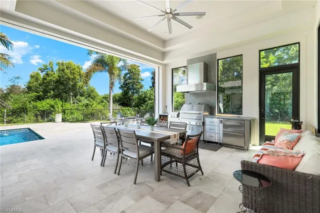 a outdoor living space with furniture and a potted plant