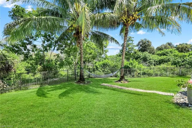 a view of a house with a yard porch and sitting area