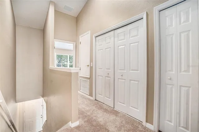 a view of a bathroom with wooden floor