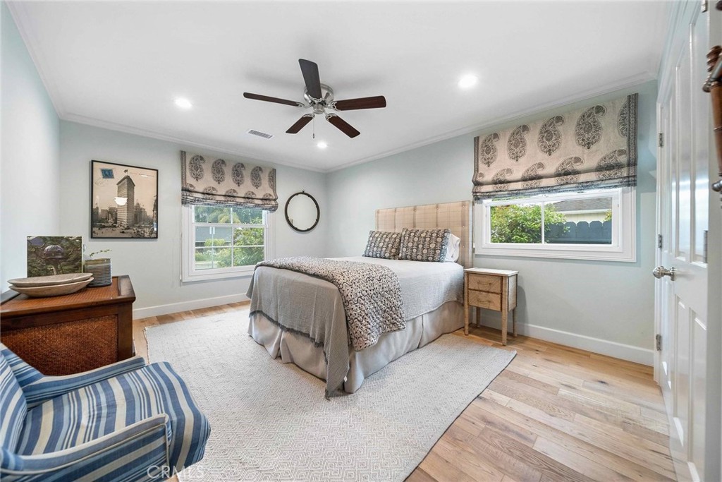 16544 Greenleaf Street Encino, CA 91436 - Photo 14 of 23 a bedroom with a large bed and a window
