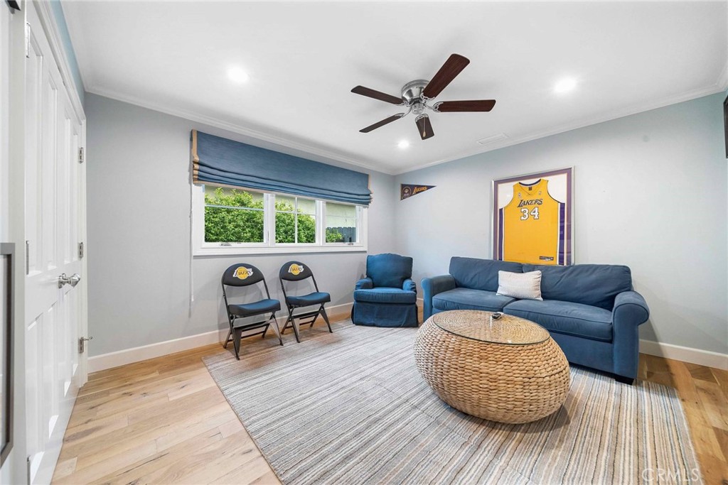 16544 Greenleaf Street Encino, CA 91436 - Photo 17 of 23 a living room with furniture and a window