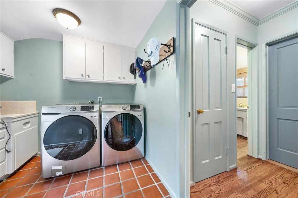 16544 Greenleaf Street Encino, CA 91436 - Photo 20 of 23 a view of a storage & utility room with a washer dryer