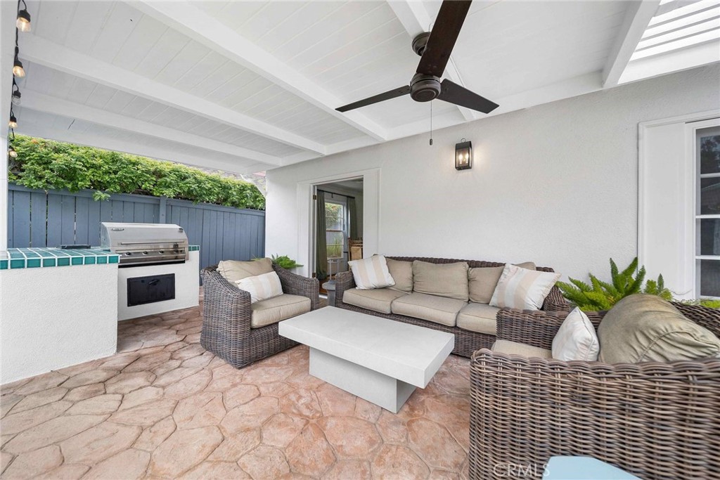 16544 Greenleaf Street Encino, CA 91436 - Photo 21 of 23 a living room with furniture and a fireplace