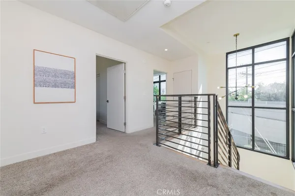 a view of livingroom with furniture and window