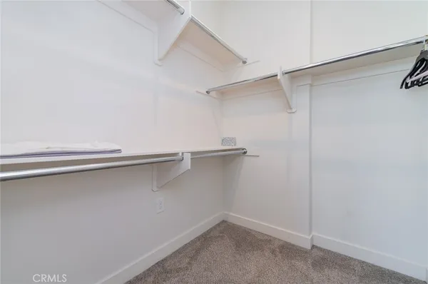 a view of an empty walk in closet