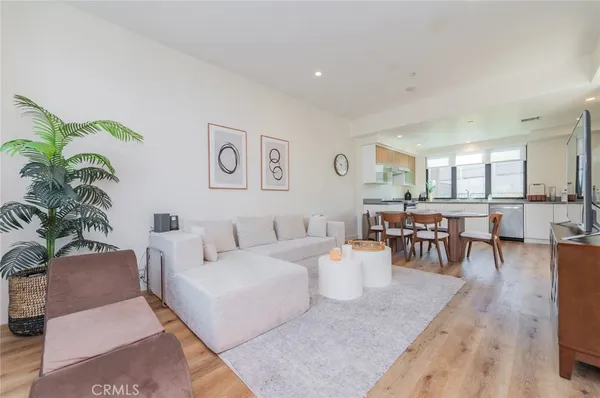 a living room with furniture and a table