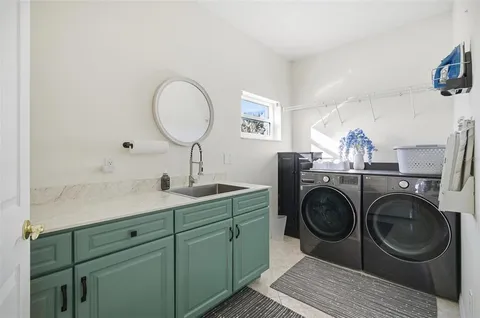 a bathroom with a tub and a shower