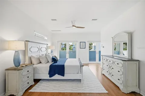 a view of a floor to ceiling window and wooden floor
