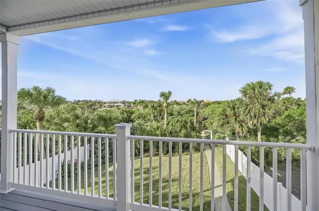 a kitchen with stainless steel appliances granite countertop a sink a refrigerator and a stove