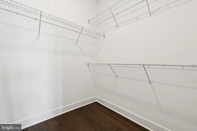 a view of a room with racks on the wall