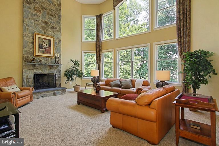 12121 Sheets Farm Road North Potomac, MD 20878 - Photo 14 of 29 Two Story Fireplace with Gas Log