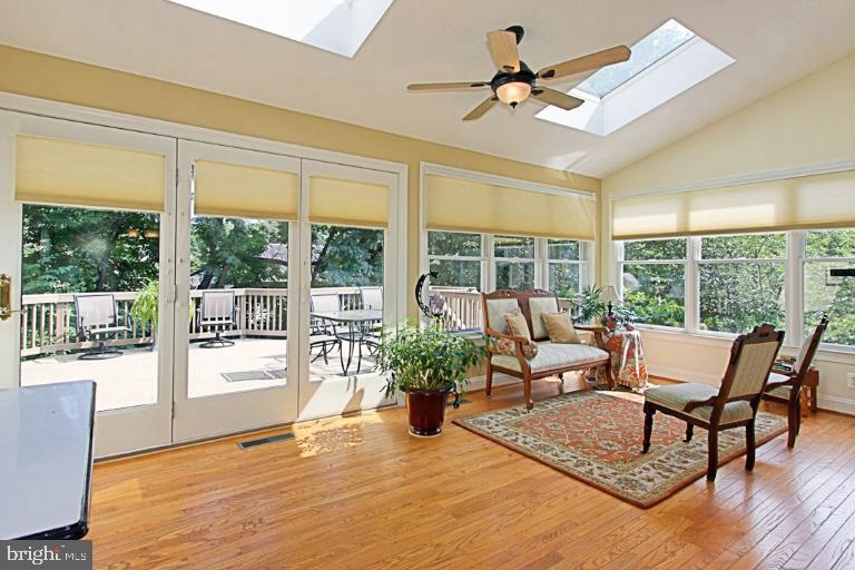 12121 Sheets Farm Road North Potomac, MD 20878 - Photo 15 of 29 Sun Room with Skylights & Walk-out to Deck