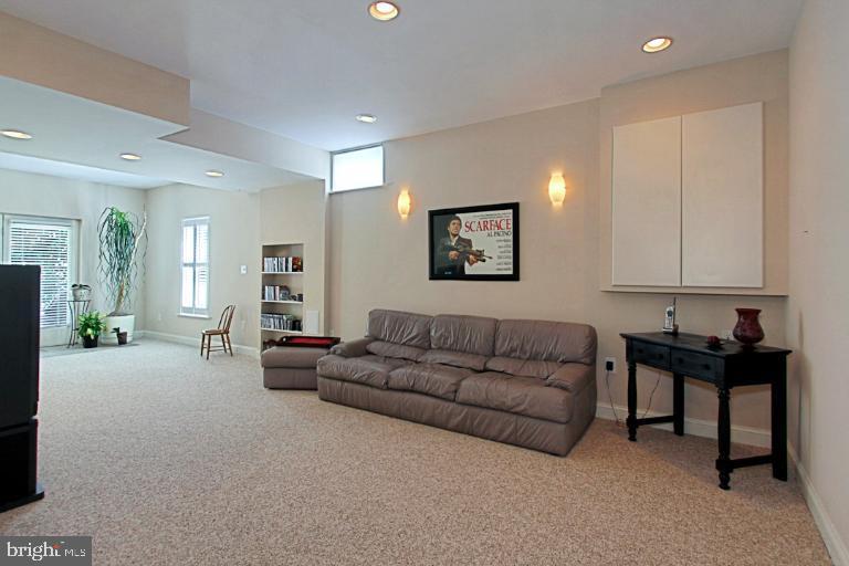 12121 Sheets Farm Road North Potomac, MD 20878 - Photo 28 of 29 Rec Room with Walk-out to Rear Yard