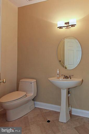 12121 Sheets Farm Road North Potomac, MD 20878 - Photo 10 of 29 Powder Room with Marble Floor