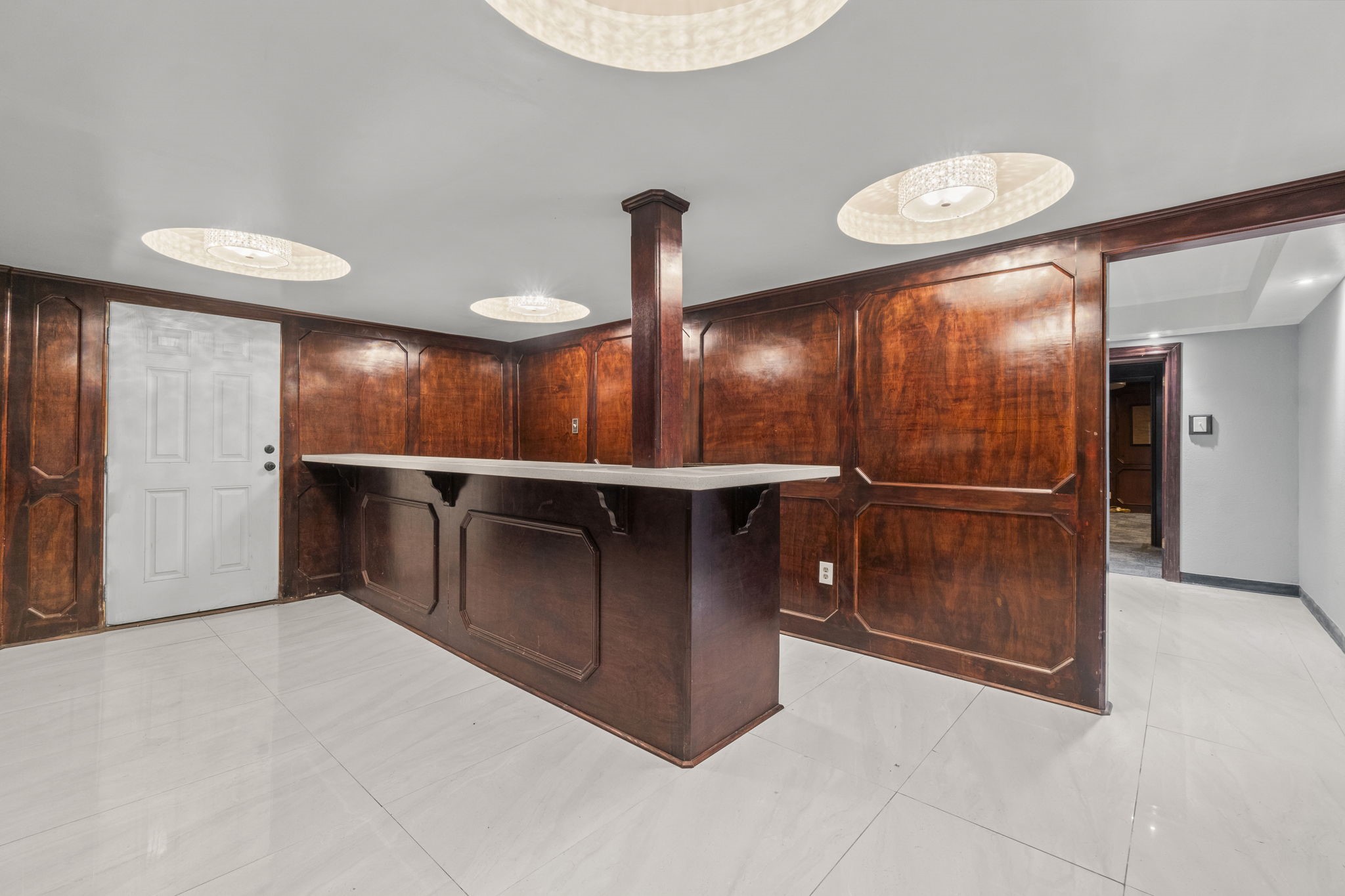 1018 Shaver Street Pasadena, TX 77506 - Photo 23 of 43 Multi-use reception counter area with polished wood paneling.
