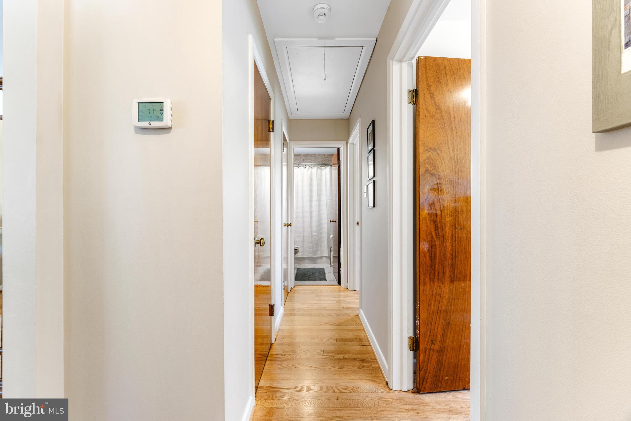 922 Cherokee Trail Frederick, MD 21701 - Photo 12 of 40 a view of a hallway with wooden floor