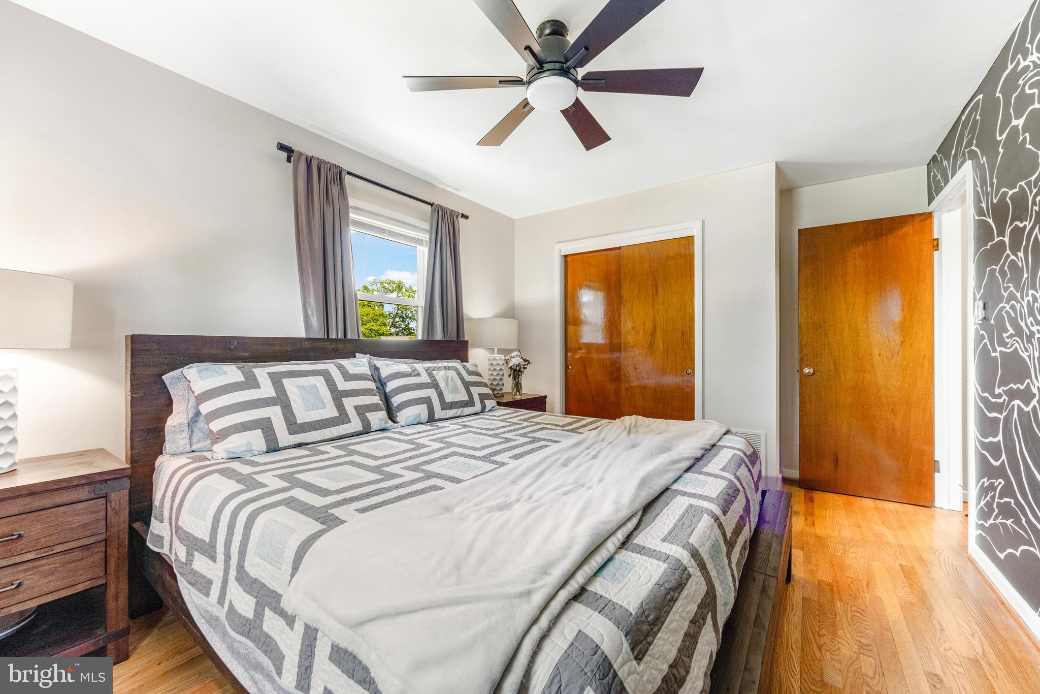 922 Cherokee Trail Frederick, MD 21701 - Photo 14 of 40 a bedroom with a bed and a window