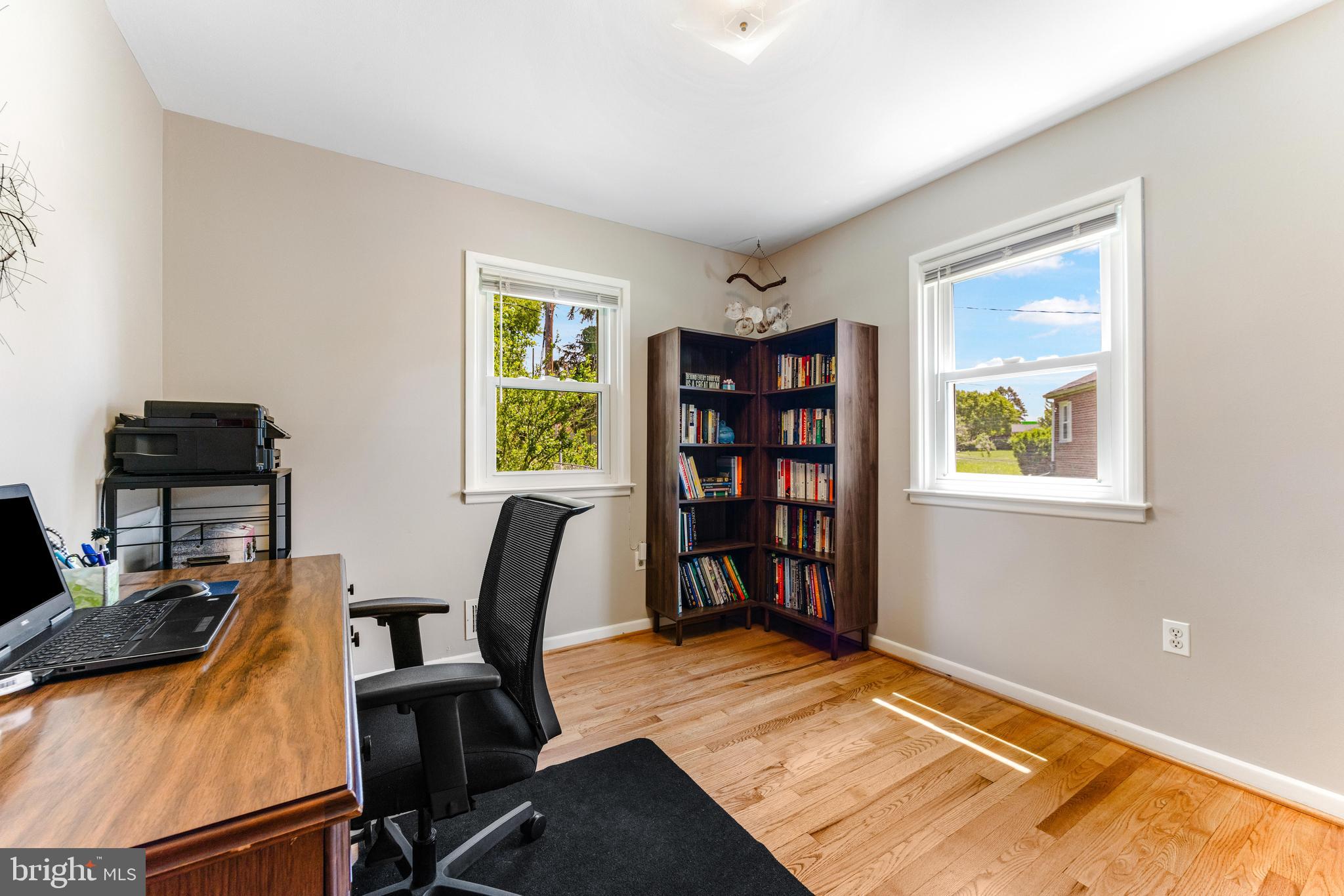 922 Cherokee Trail Frederick, MD 21701 - Photo 17 of 40 a view of a workspace with furniture and a window