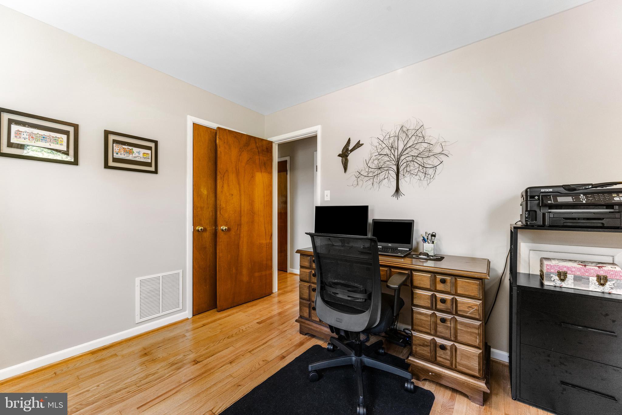 922 Cherokee Trail Frederick, MD 21701 - Photo 18 of 40 a view of a workspace with furniture and a window