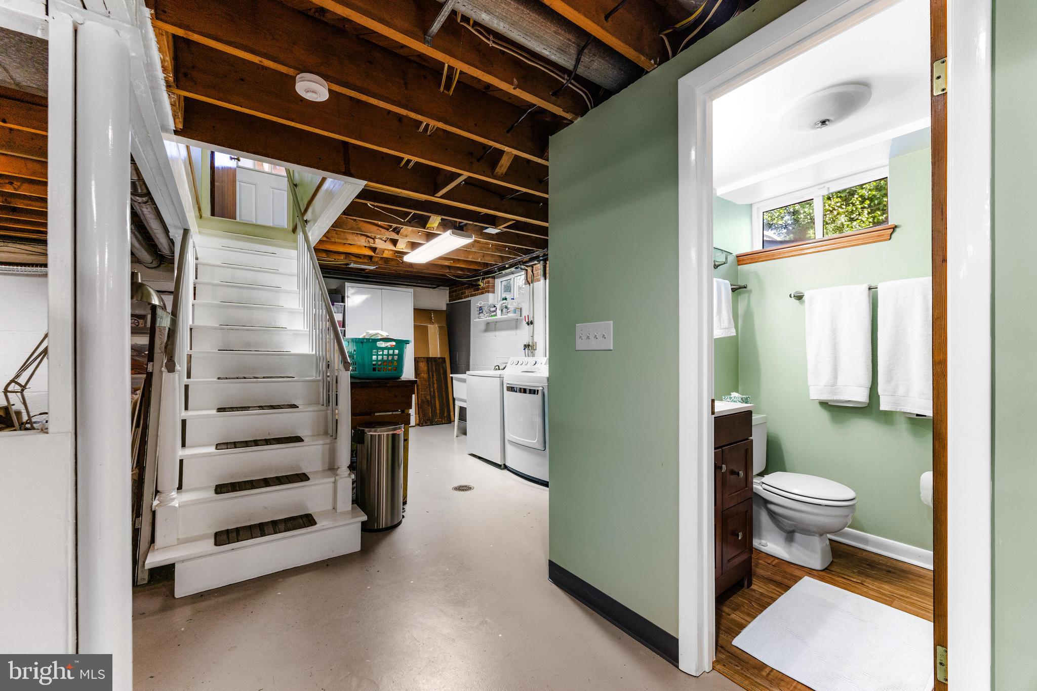 922 Cherokee Trail Frederick, MD 21701 - Photo 26 of 40 a view of a hallway with toilet and dishwasher