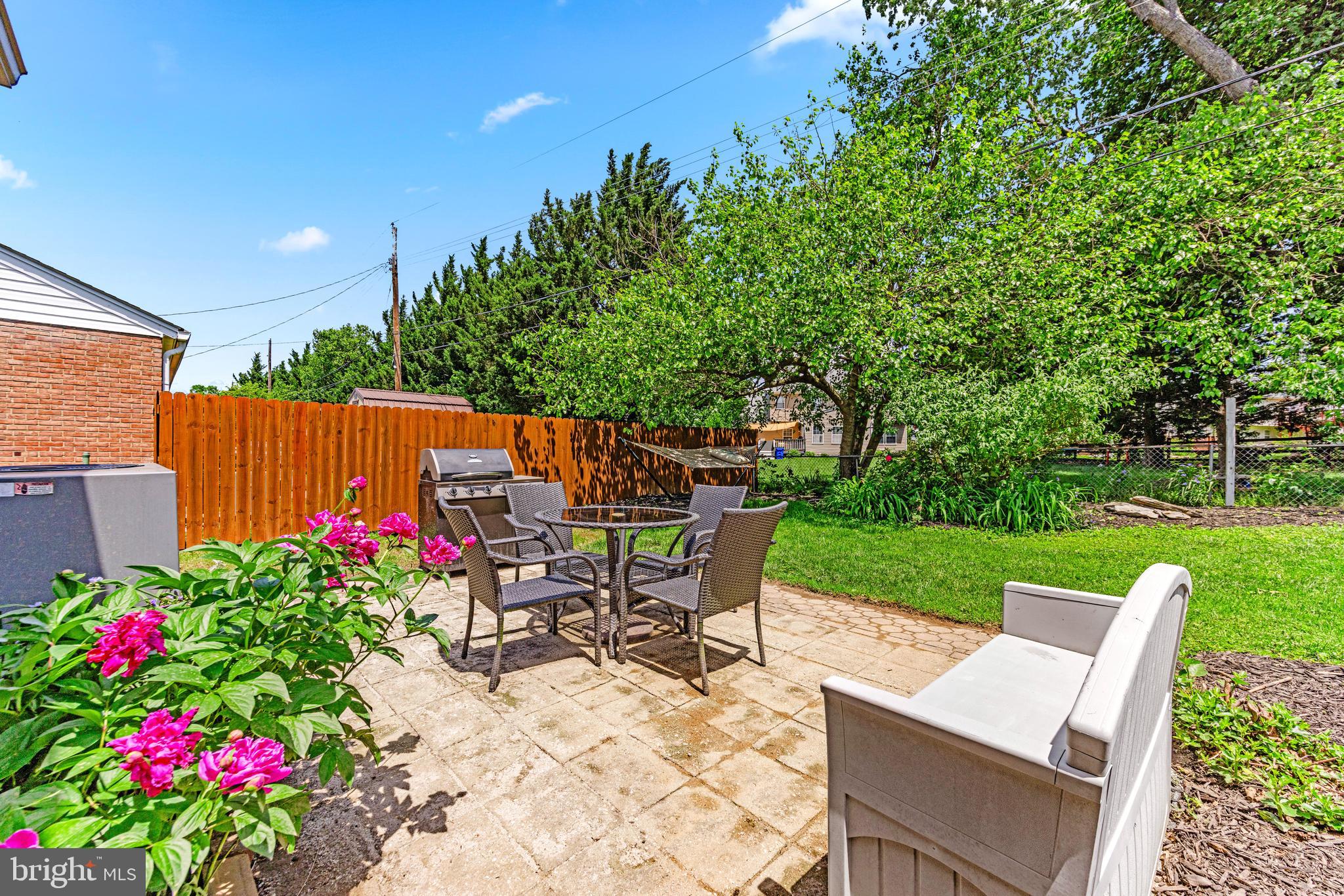 922 Cherokee Trail Frederick, MD 21701 - Photo 33 of 40 a view of a patio with table and chairs and potted plants
