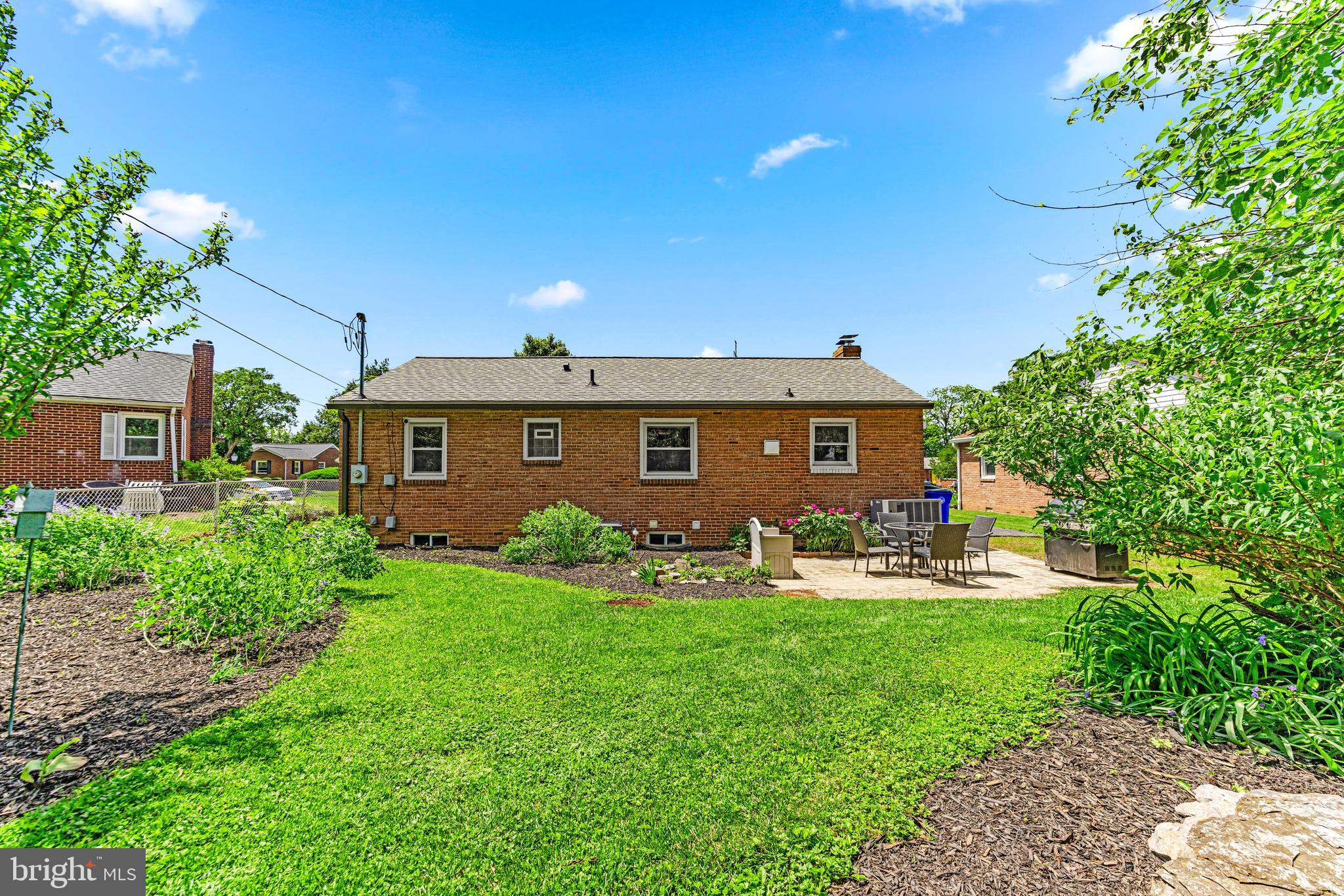 922 Cherokee Trail Frederick, MD 21701 - Photo 37 of 40 a front view of house with yard and patio