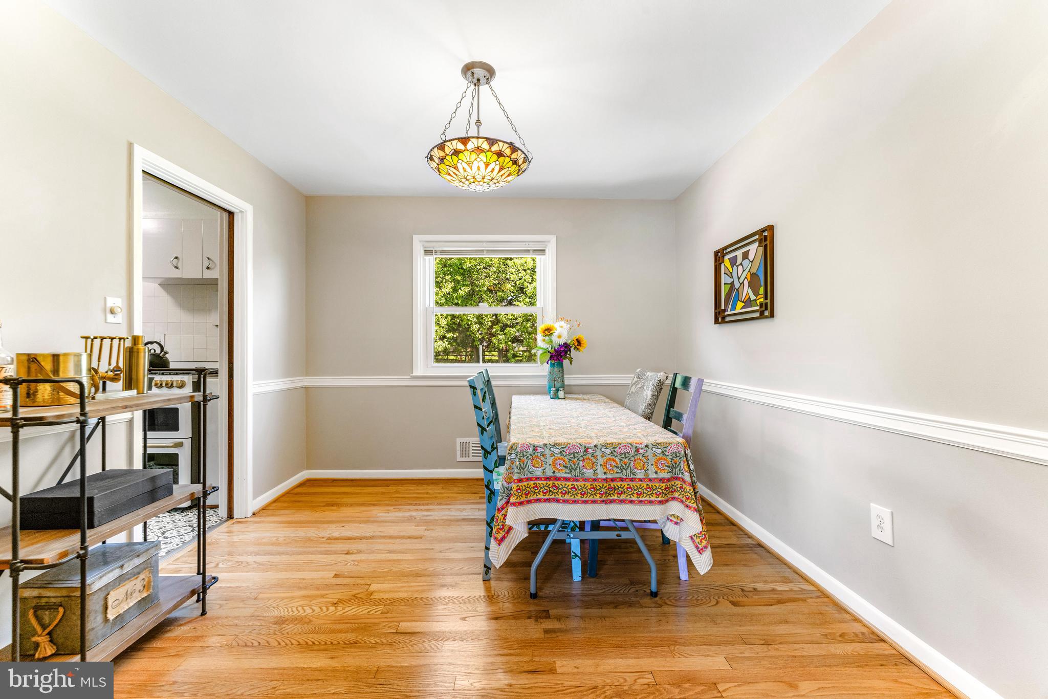 922 Cherokee Trail Frederick, MD 21701 - Photo 9 of 40 a living room with furniture and a wooden floor