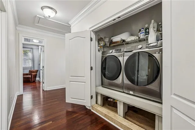 a view of a storage & utility room with washer and dryer