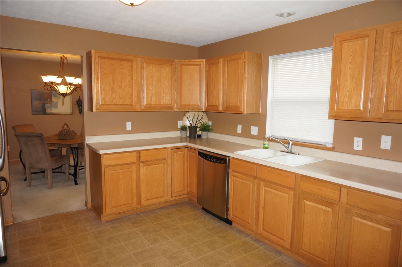 1439 Rock Island Road Davis Junction, IL 61020 - Photo 17 of 25 a kitchen with a sink and cabinets