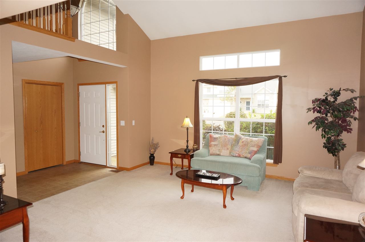 1439 Rock Island Road Davis Junction, IL 61020 - Photo 6 of 25 a living room with furniture and a large window