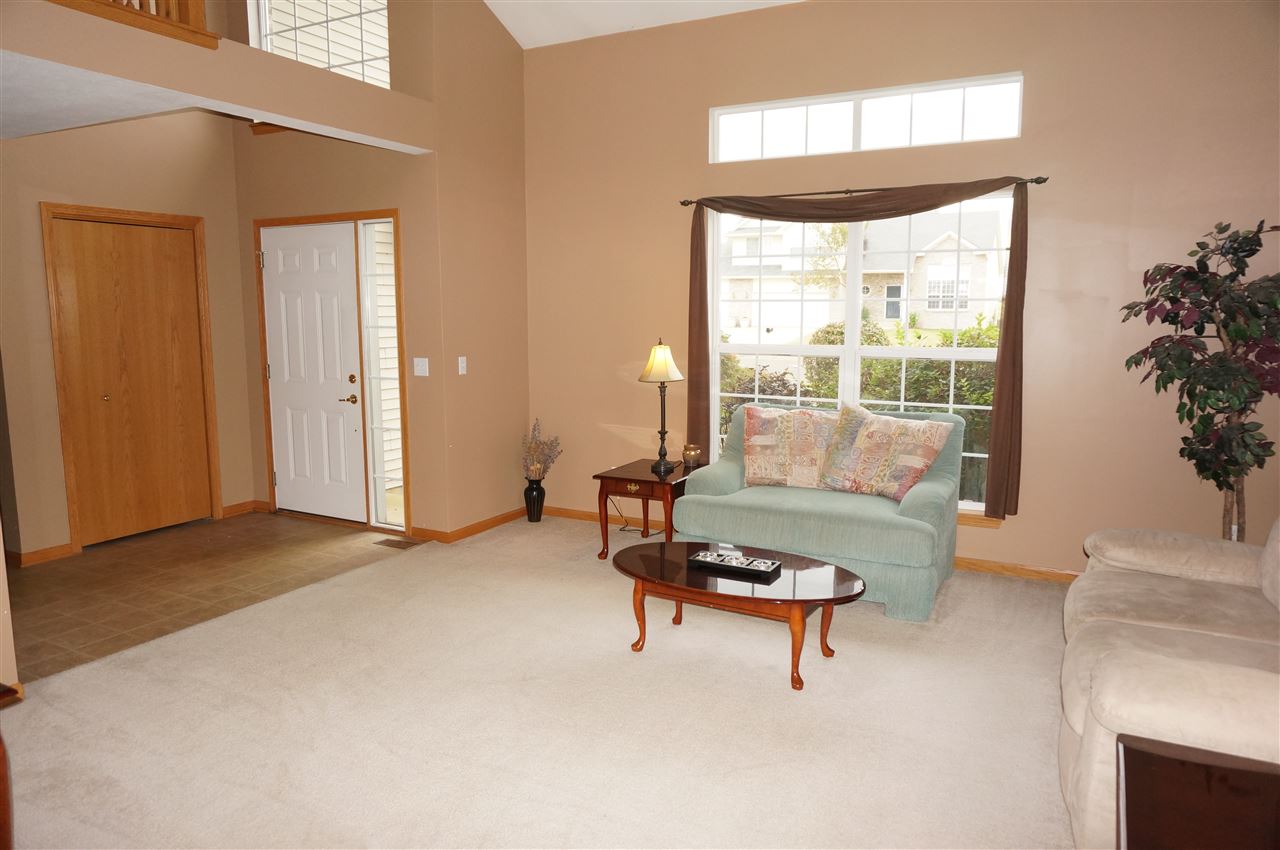 1439 Rock Island Road Davis Junction, IL 61020 - Photo 7 of 25 a living room with furniture and a window