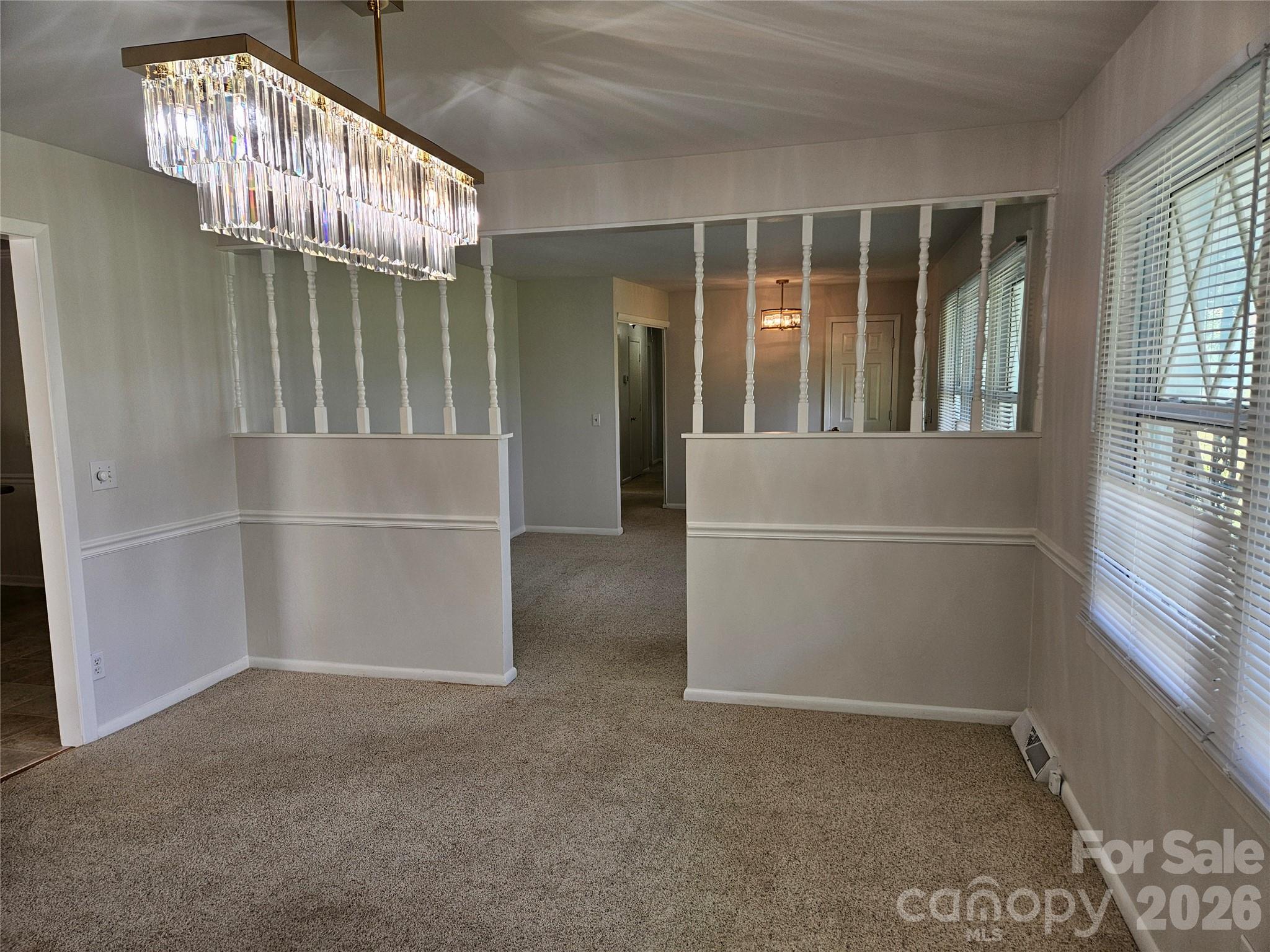 20402 Norton Road Albemarle, NC 28001 - Photo 20 of 34 an empty room with windows