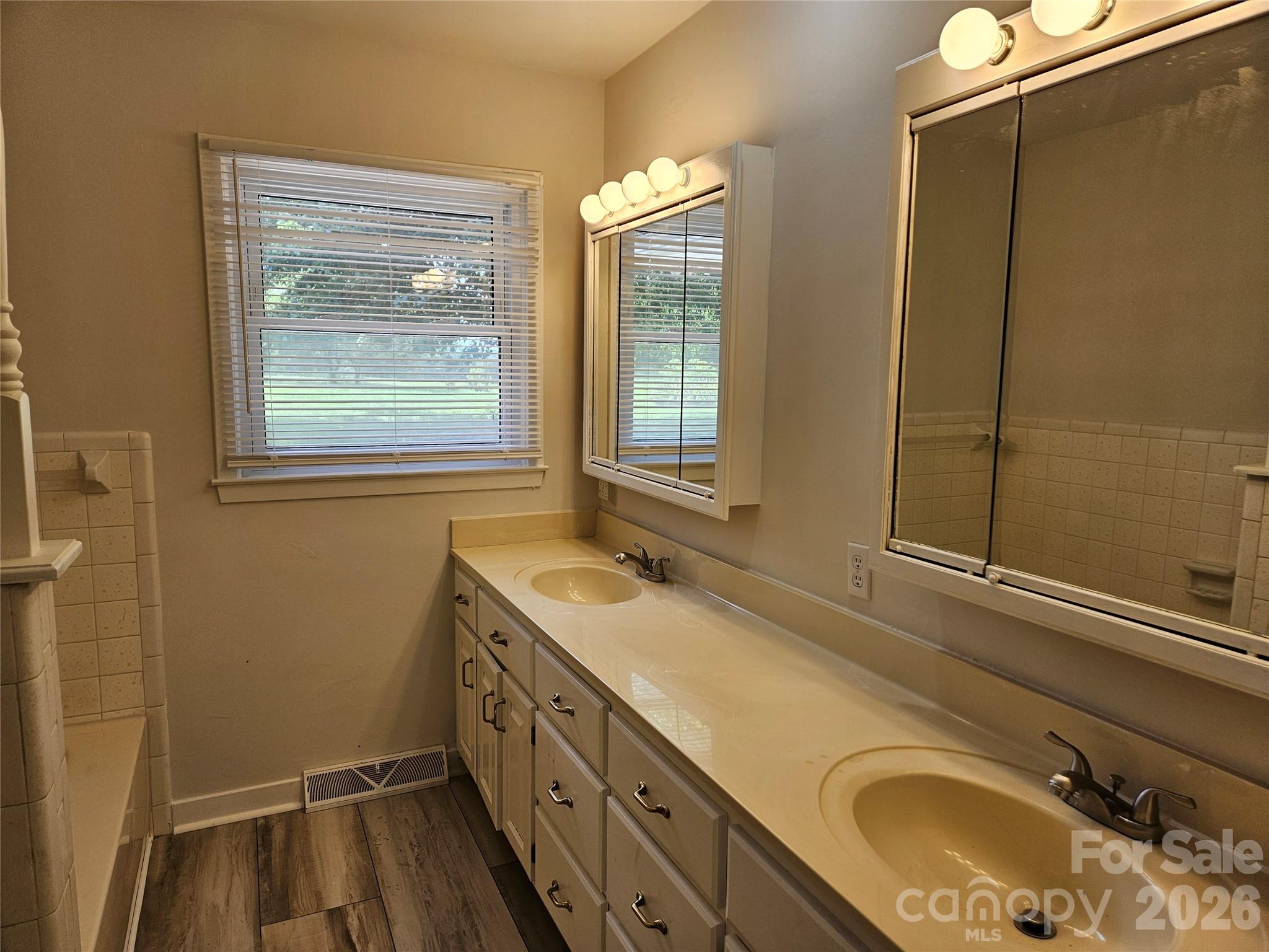 20402 Norton Road Albemarle, NC 28001 - Photo 23 of 34 a bathroom with a sink and a mirror