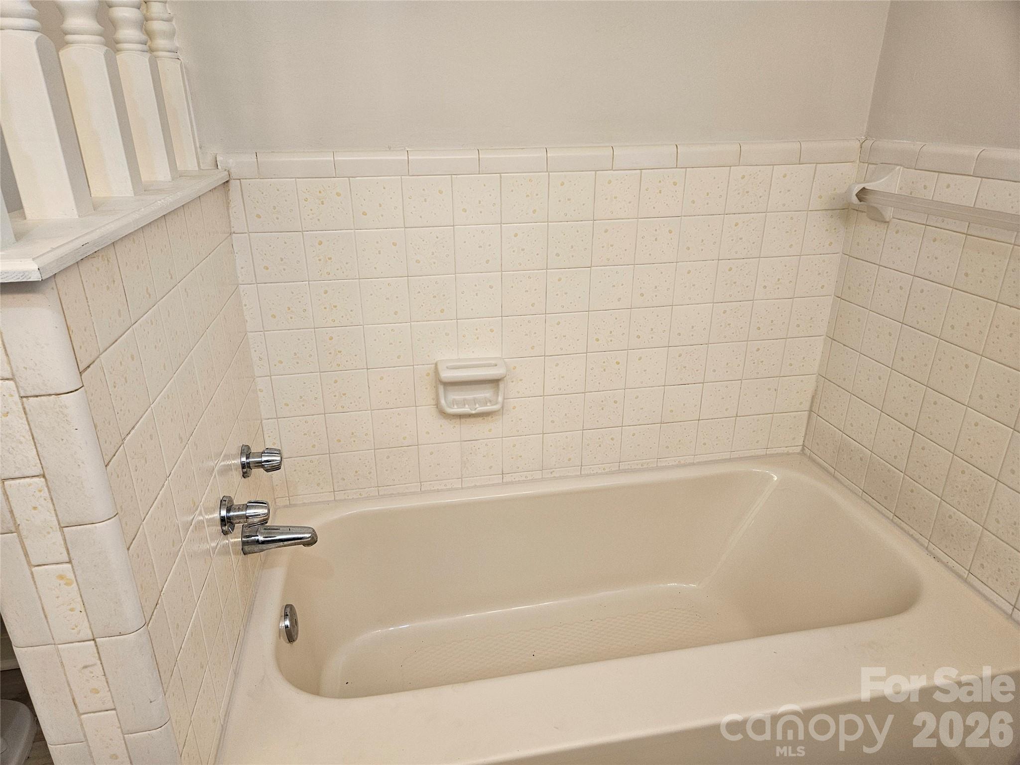 20402 Norton Road Albemarle, NC 28001 - Photo 24 of 34 a bath tub sitting next to a shower