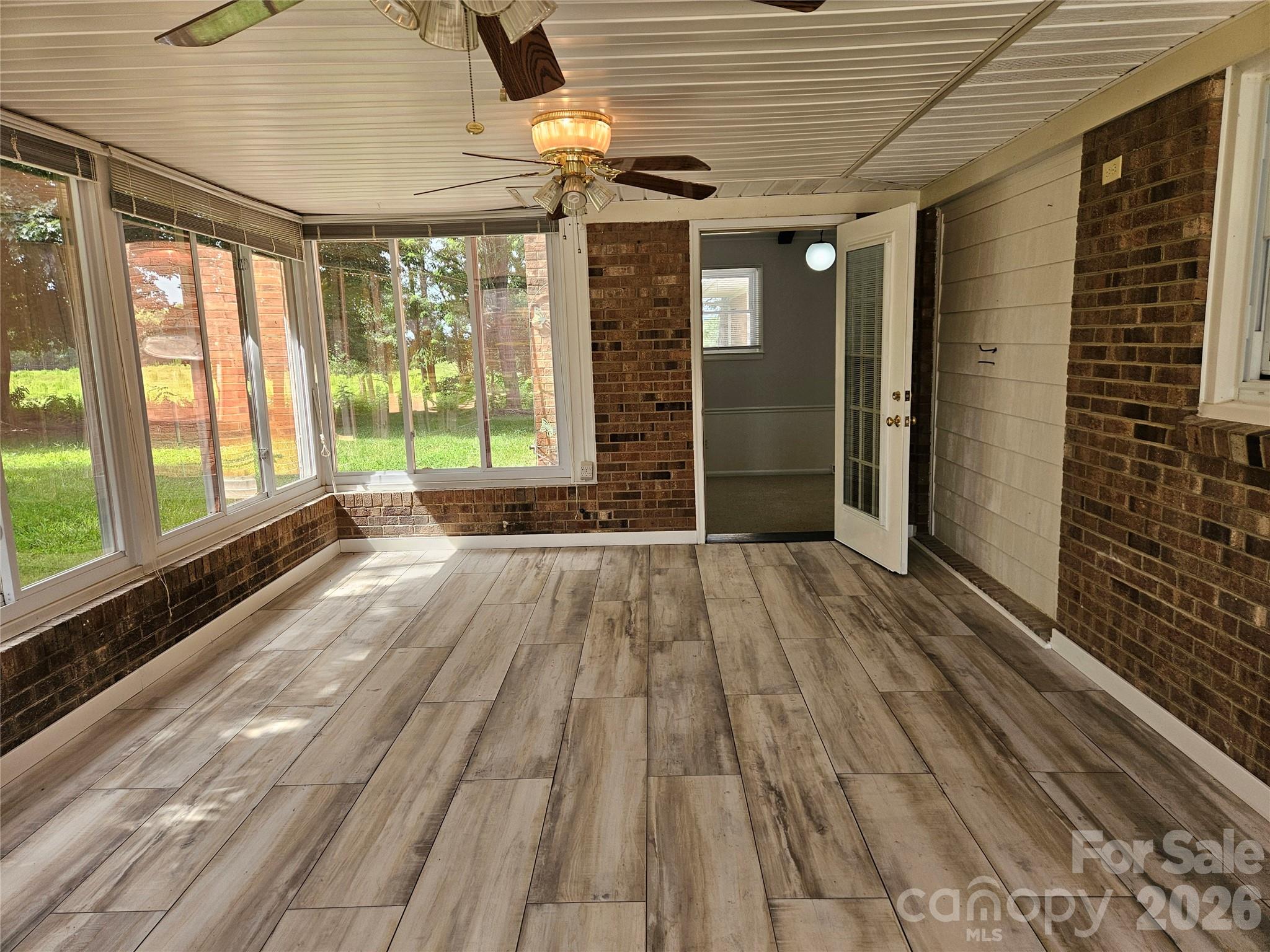 20402 Norton Road Albemarle, NC 28001 - Photo 32 of 34 a view of outdoor space with wooden floor and windows