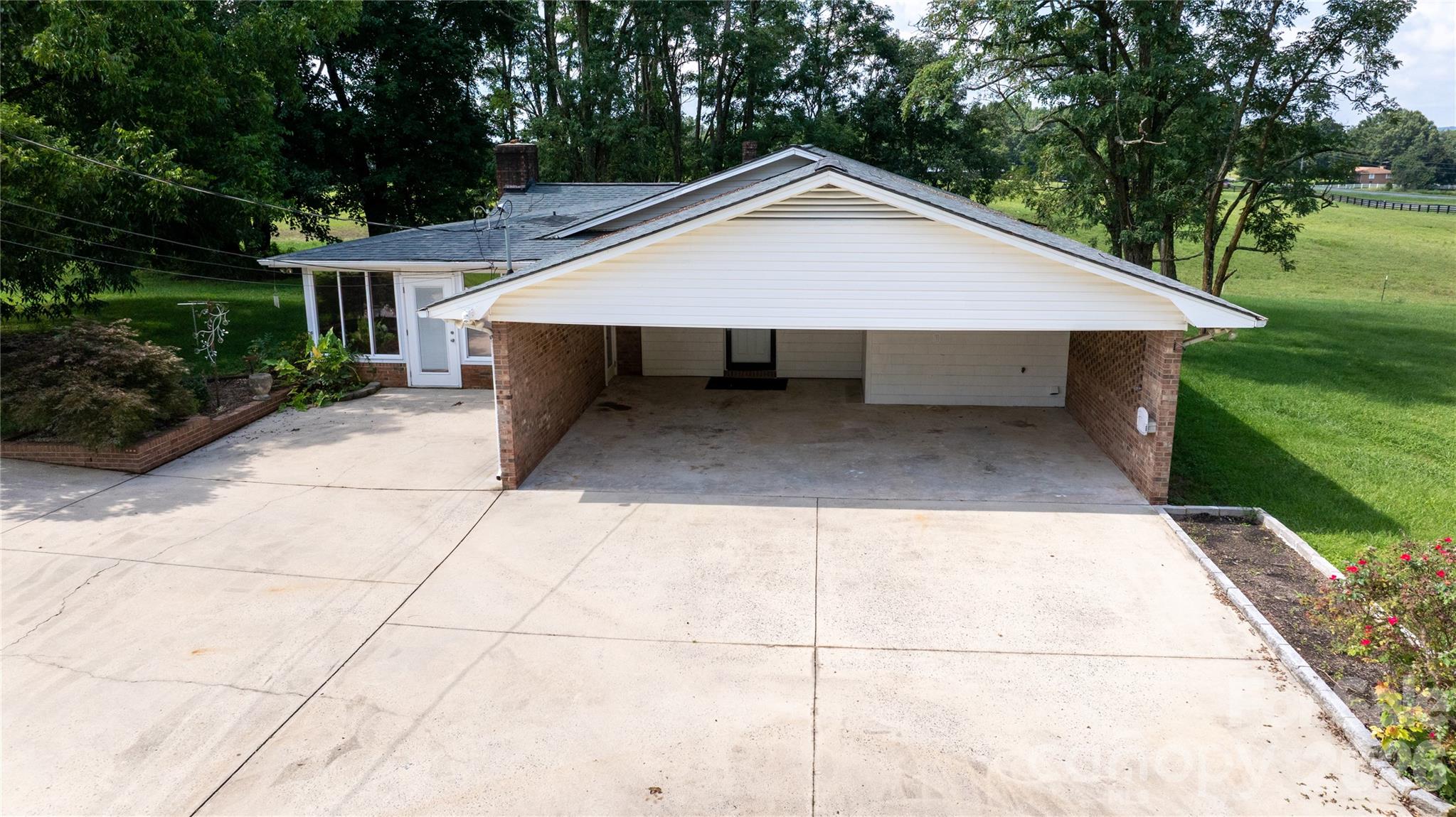 20402 Norton Road Albemarle, NC 28001 - Photo 6 of 34 a house view with a outdoor space