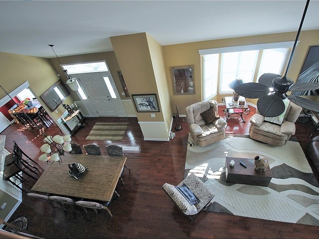1012 Riviera Drive Elgin, IL 60124 - Photo 14 of 25 a living room with furniture and a table