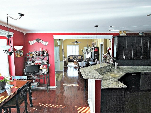 1012 Riviera Drive Elgin, IL 60124 - Photo 8 of 25 a view of a living room and kitchen