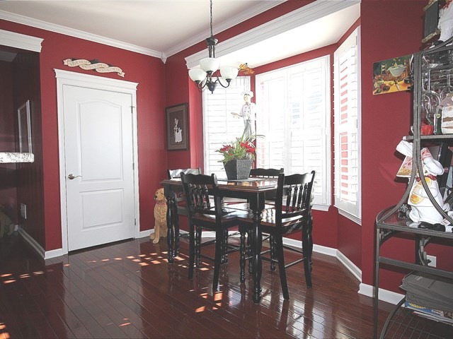 1012 Riviera Drive Elgin, IL 60124 - Photo 9 of 25 a view of a dining room with furniture window and outside view