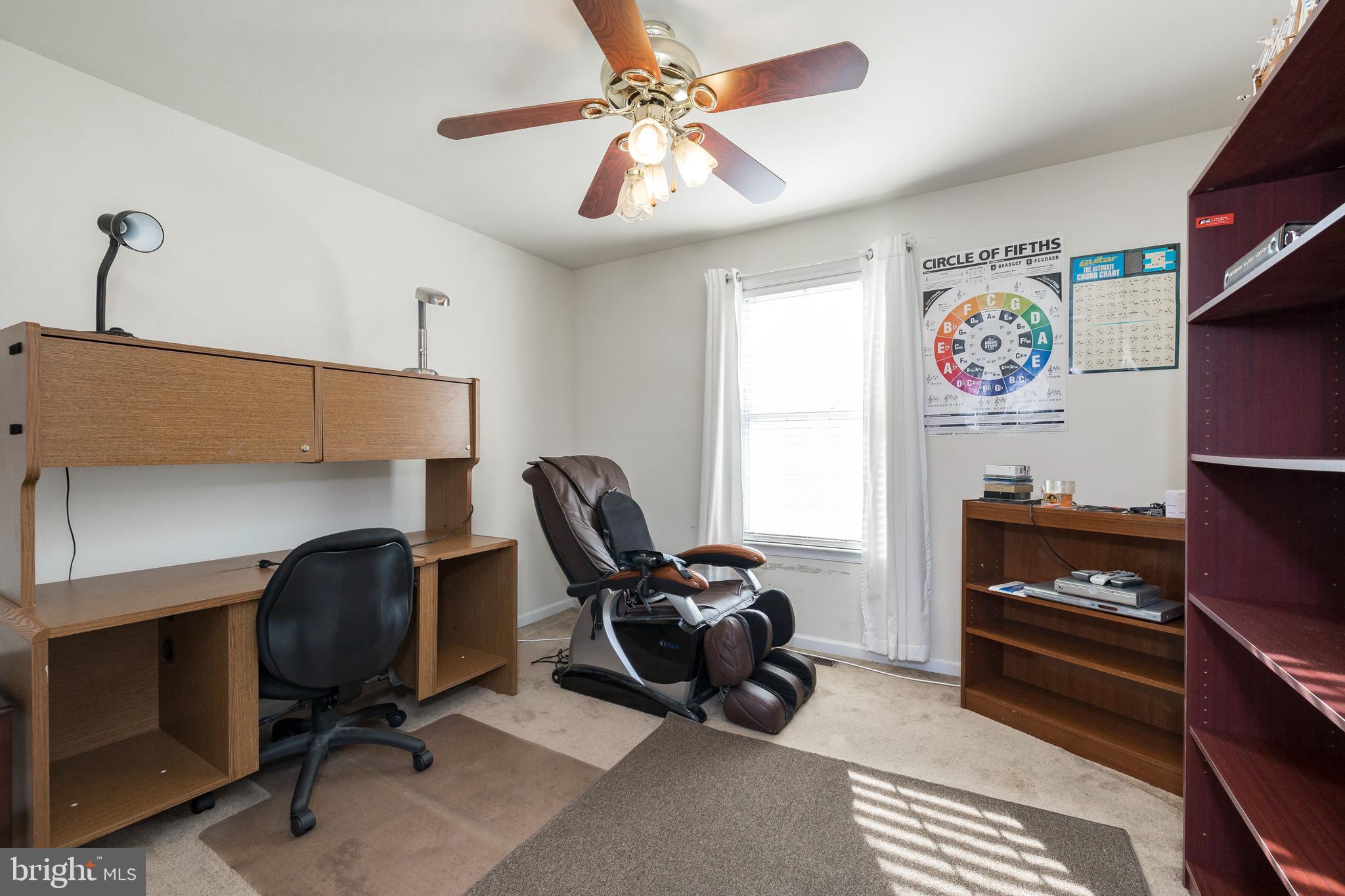 877 Church Road Harleysville, PA 19438 - Photo 14 of 48 a workspace with furniture and ceiling fan