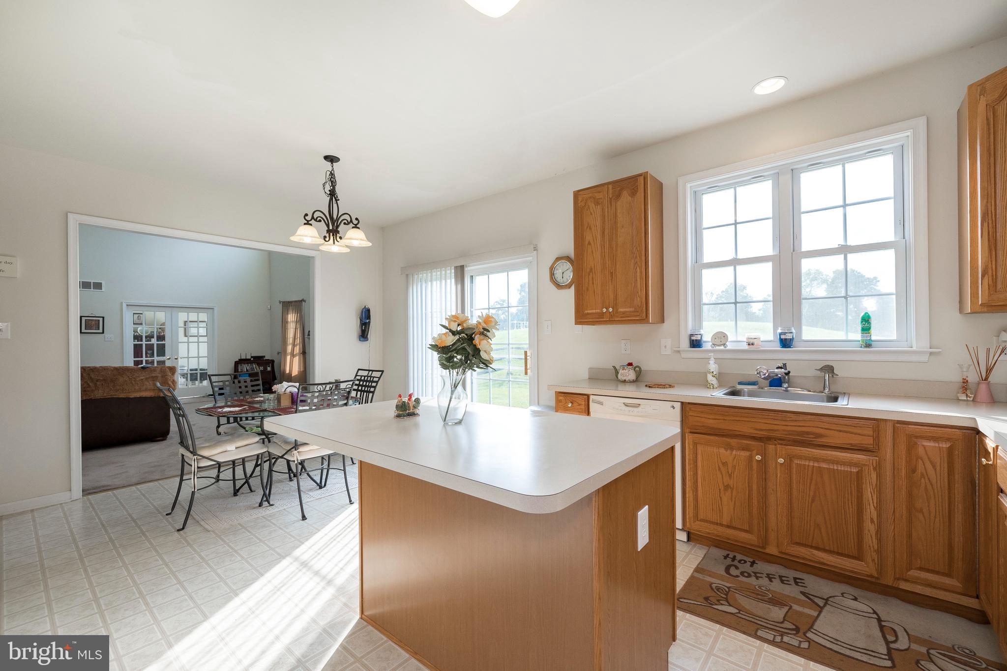 877 Church Road Harleysville, PA 19438 - Photo 23 of 48 a kitchen with a sink stove and cabinets