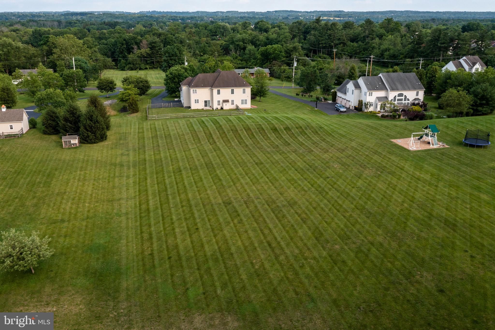 877 Church Road Harleysville, PA 19438 - Photo 34 of 48 a view of a house with a yard