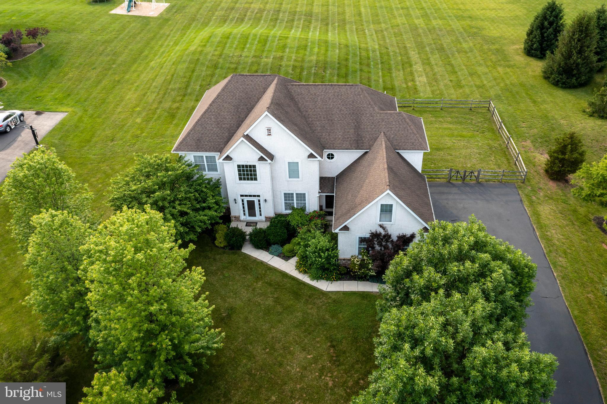 877 Church Road Harleysville, PA 19438 - Photo 46 of 48 an aerial view of residential houses with outdoor space and trees